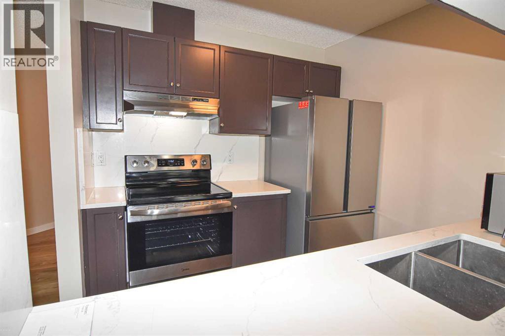 109, 2022 Canyon Meadows Drive Se, Calgary, Alberta  T2J 7H1 - Photo 8 - A2302347