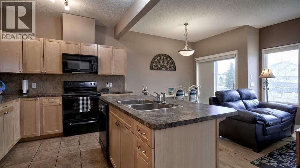 805, 620 Luxstone Landing Sw, Airdrie, Alberta  T4B 0B6 - Photo 6 - A2300918