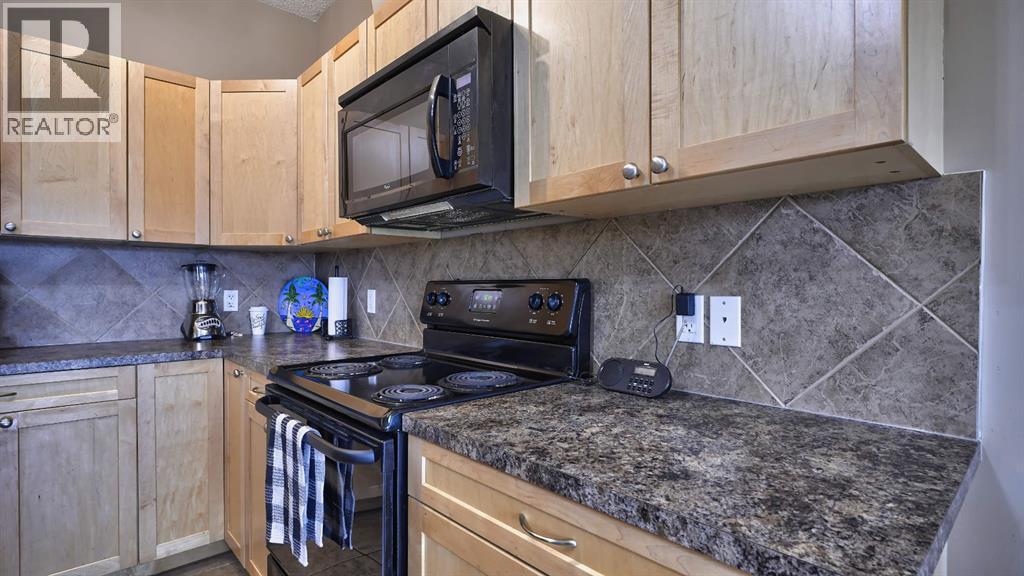 805, 620 Luxstone Landing Sw, Airdrie, Alberta  T4B 0B6 - Photo 9 - A2300918