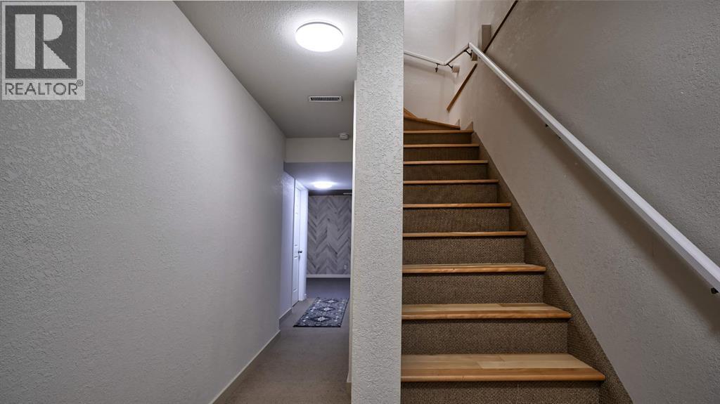 805, 620 Luxstone Landing Sw, Airdrie, Alberta  T4B 0B6 - Photo 32 - A2300918