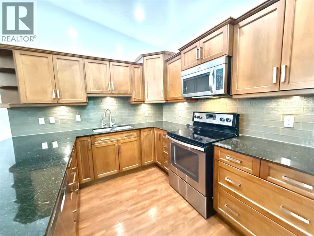 501 Sunvale Crescent NE, High River, Alberta  T1V 0E8 - Photo 10 - A2303703