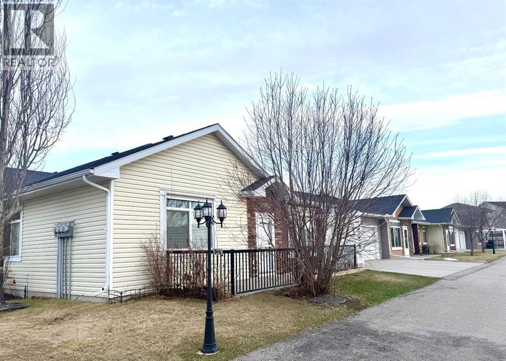 501 Sunvale Crescent NE, High River, Alberta  T1V 0E8 - Photo 3 - A2303703