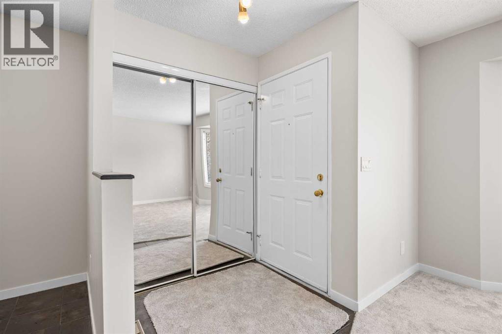 119 Bedfield Close Ne, Calgary, Alberta  T3K 3L6 - Photo 4 - A2303438