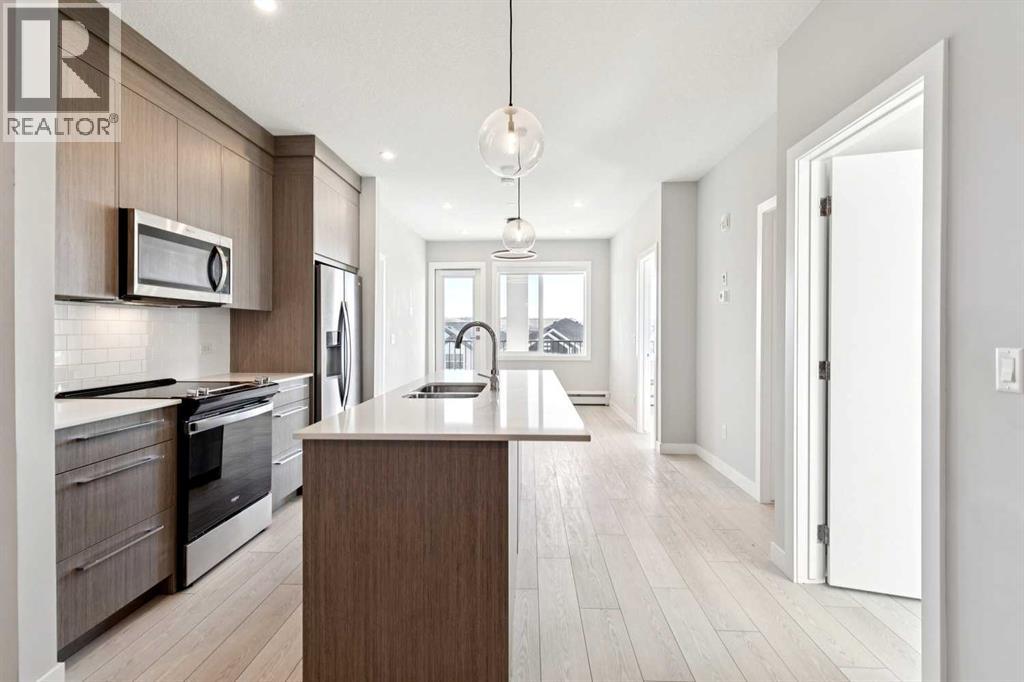 1305, 111 Wolf Creek Drive Se, Calgary, Alberta  T2X 5X2 - Photo 3 - A2304195