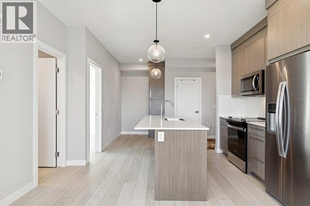 1305, 111 Wolf Creek Drive Se, Calgary, Alberta  T2X 5X2 - Photo 5 - A2304195