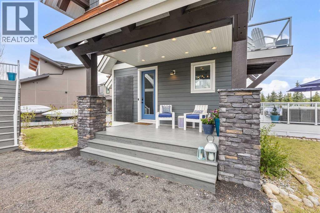 332 Cottageclub Way, Rural Rocky View County, Alberta  T4C 1C3 - Photo 3 - A2293703