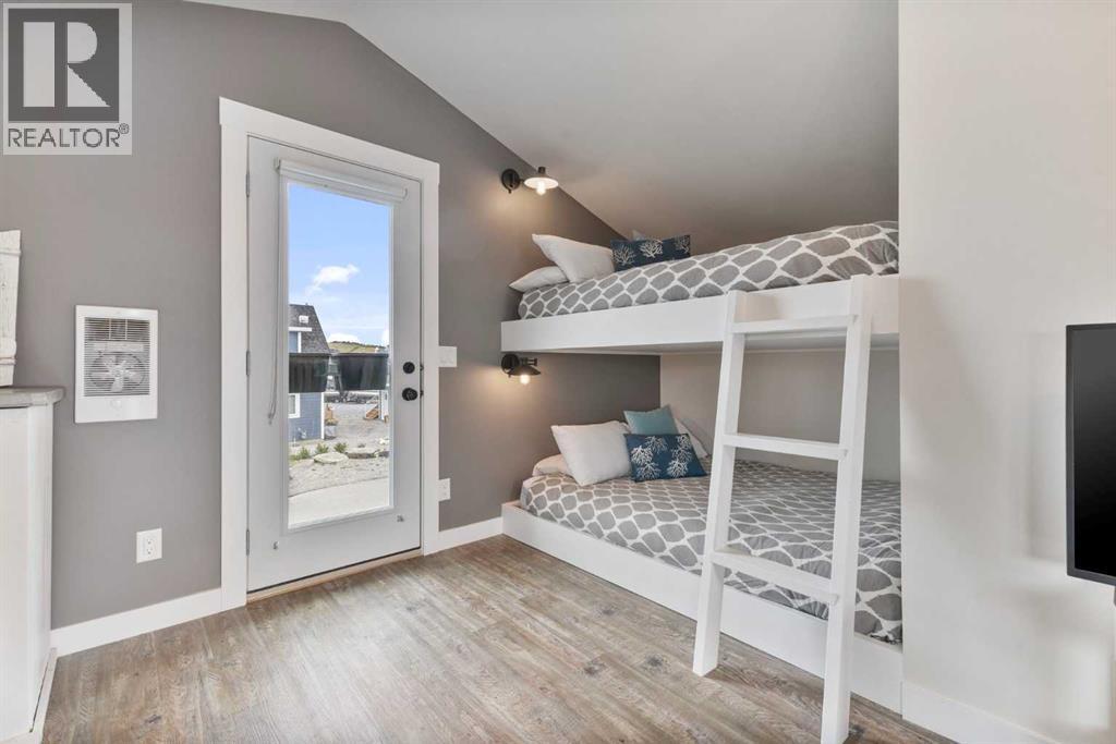 332 Cottageclub Way, Rural Rocky View County, Alberta  T4C 1C3 - Photo 32 - A2293703