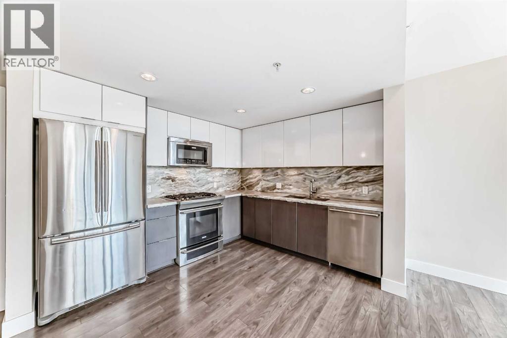 204, 560 6 Avenue Se, Calgary, Alberta  T2G 1K5 - Photo 6 - A2302332