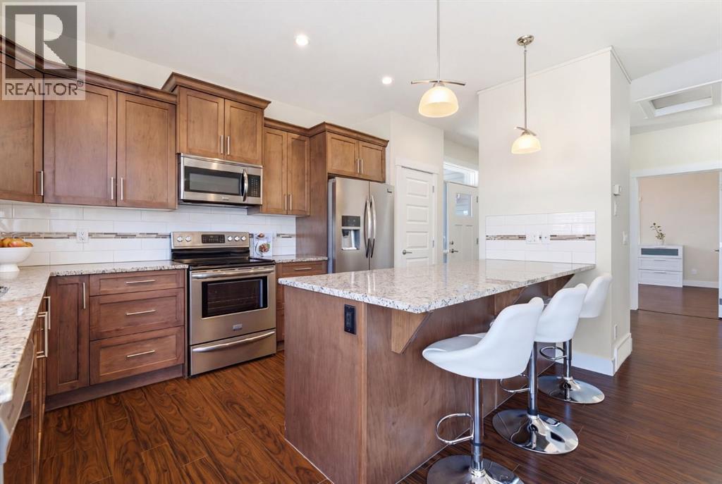 403, 110 Coopers Common Sw, Airdrie, Alberta  T4B 3Y3 - Photo 3 - A2303776