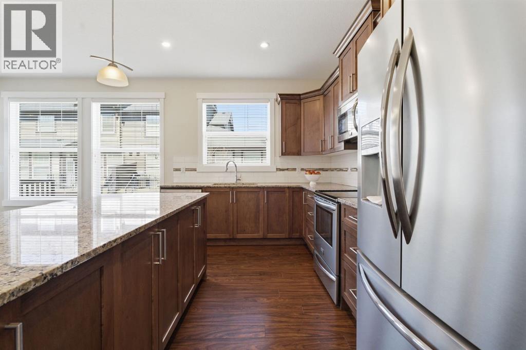 403, 110 Coopers Common Sw, Airdrie, Alberta  T4B 3Y3 - Photo 4 - A2303776