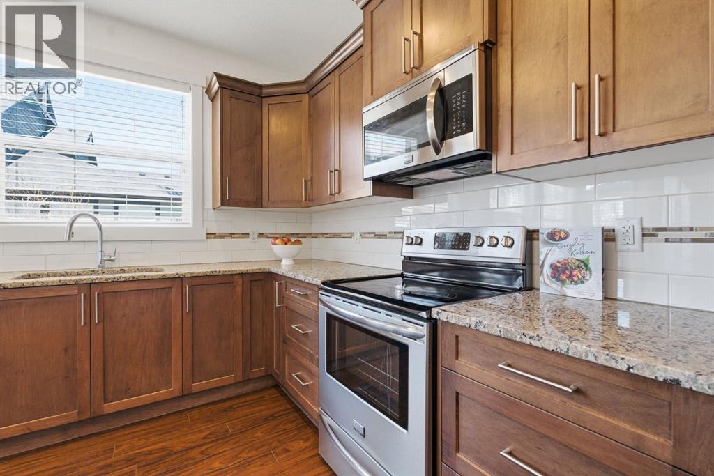 403, 110 Coopers Common Sw, Airdrie, Alberta  T4B 3Y3 - Photo 7 - A2303776