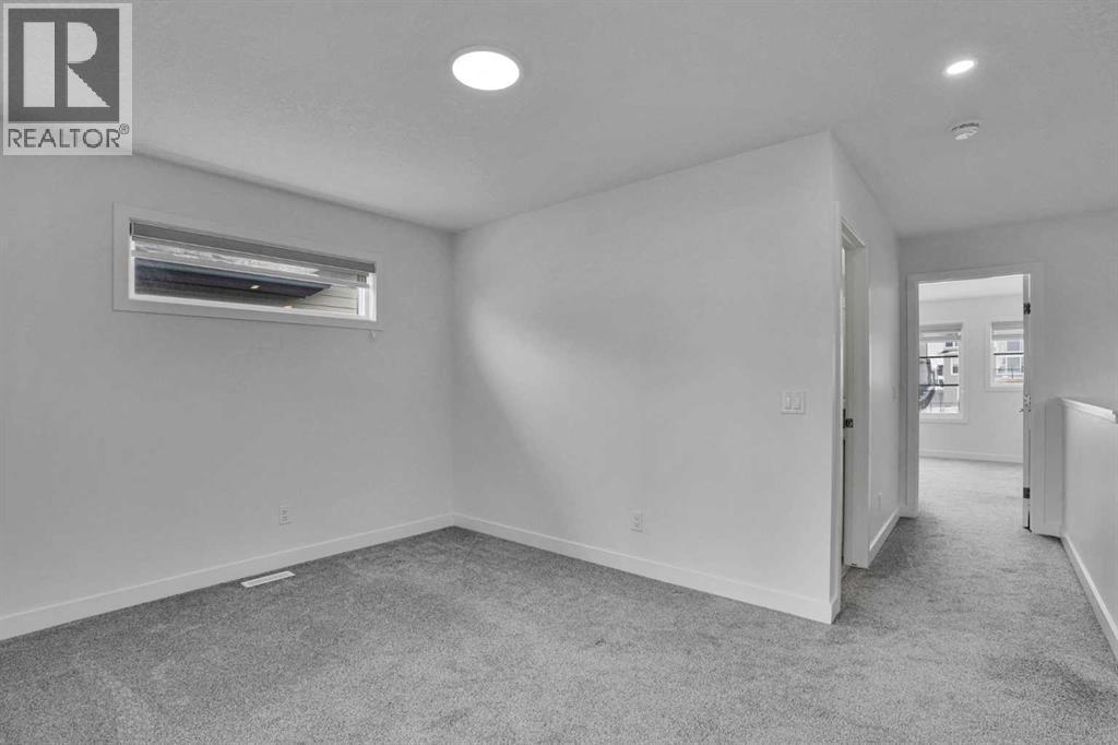 26 Amblehurst Path NW, Calgary, Alberta  T3P 1W8 - Photo 22 - A2297433