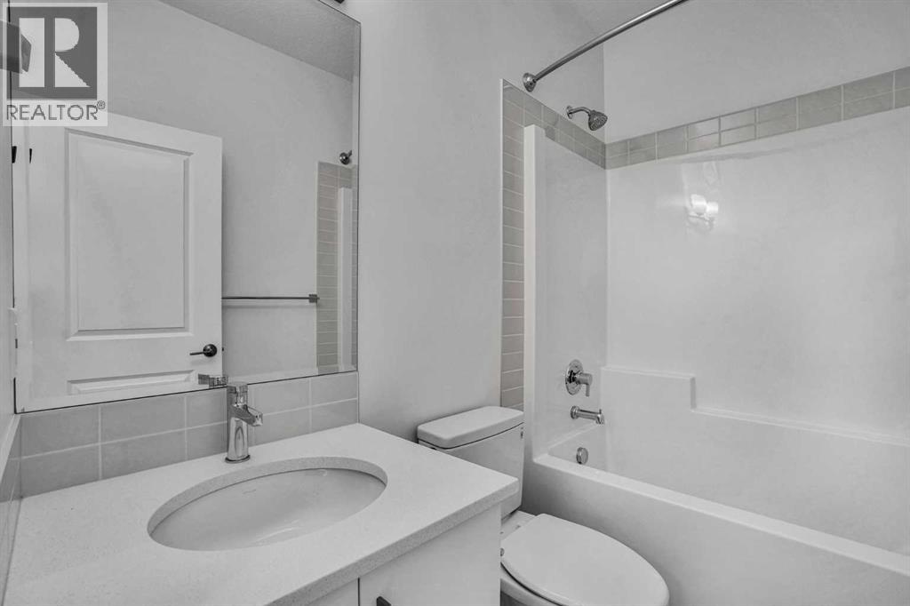 26 Amblehurst Path NW, Calgary, Alberta  T3P 1W8 - Photo 6 - A2297433