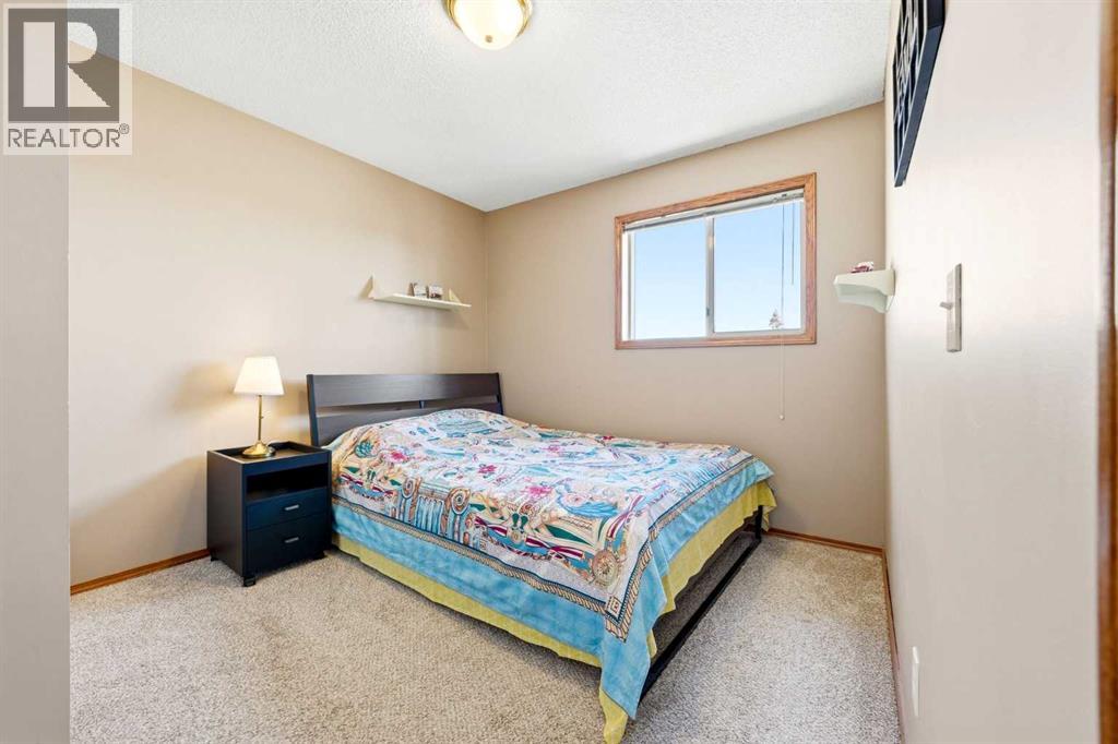 129 Arbour Ridge Circle Nw, Calgary, Alberta  T3G 3Y9 - Photo 25 - A2304394