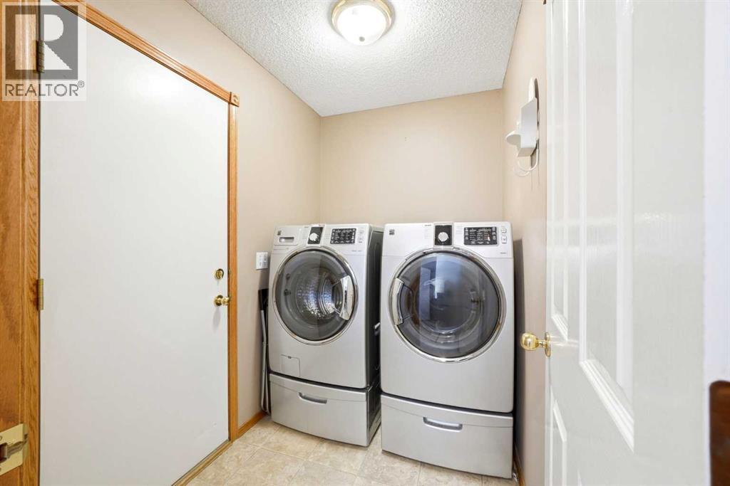 129 Arbour Ridge Circle Nw, Calgary, Alberta  T3G 3Y9 - Photo 15 - A2304394