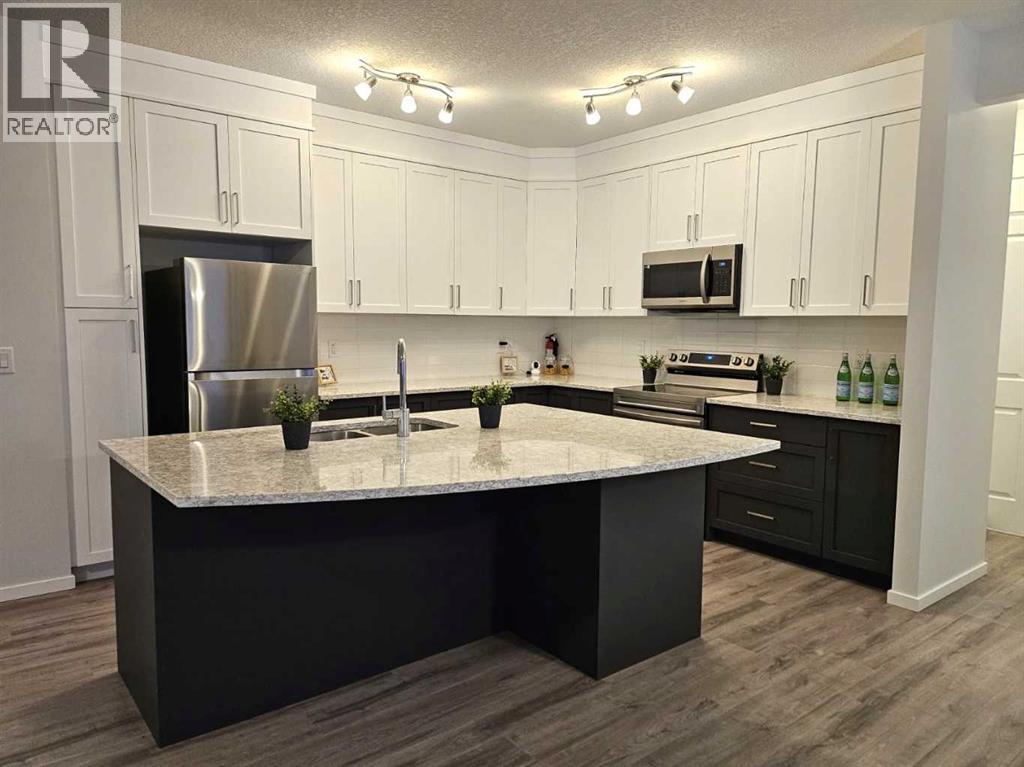 26 Carringwood Street NW, Calgary, Alberta  T3P 2A8 - Photo 2 - A2285730