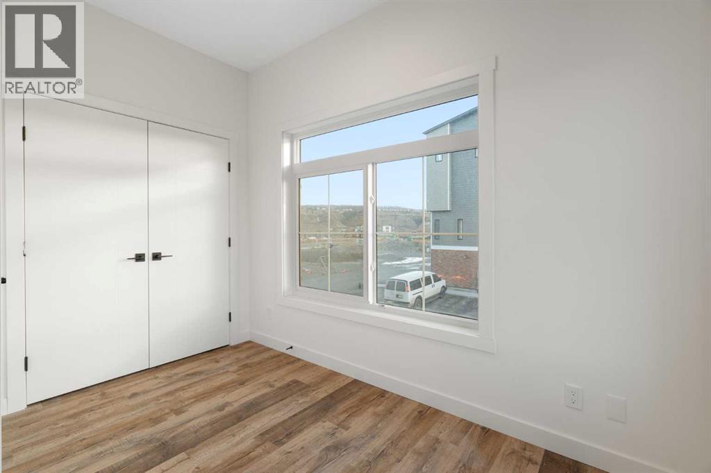 208, 156 Park Street, Cochrane, Alberta  T4C 2B8 - Photo 21 - A2291443