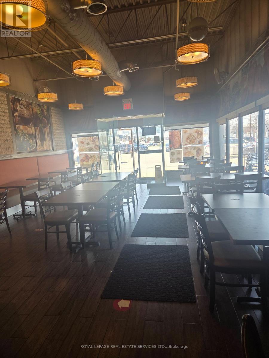 110 - 5555 Eglinton Avenue W, Toronto, Ontario  M9C 5M1 - Photo 2 - W12921828