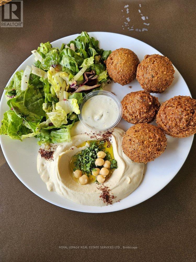 110 - 5555 Eglinton Avenue W, Toronto, Ontario  M9C 5M1 - Photo 3 - W12921828