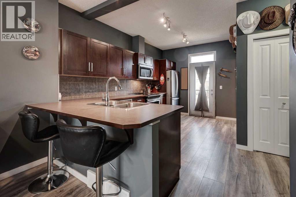173 New Brighton Point Se, Calgary, Alberta  T2Z 1B6 - Photo 4 - A2302262