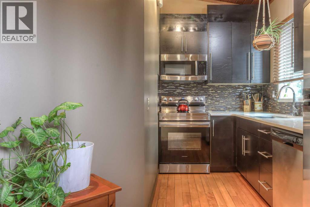 172 Oaktree Lane Sw, Calgary, Alberta  T2V 4E4 - Photo 11 - A2302781