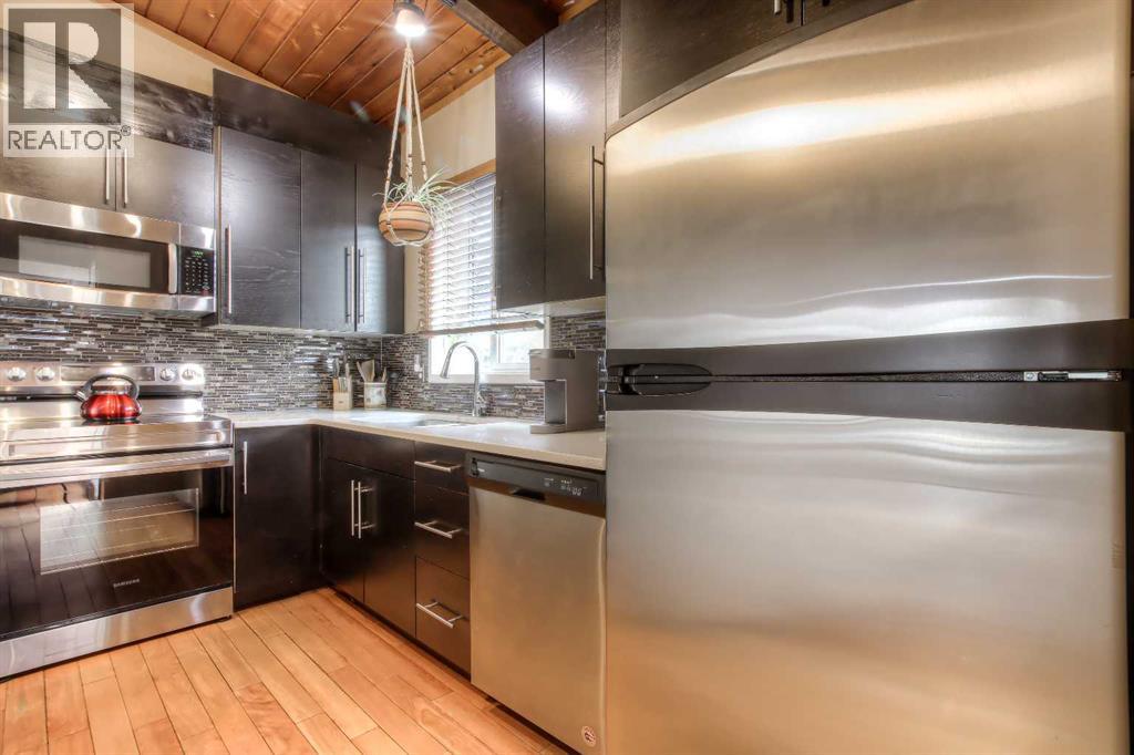 172 Oaktree Lane Sw, Calgary, Alberta  T2V 4E4 - Photo 10 - A2302781