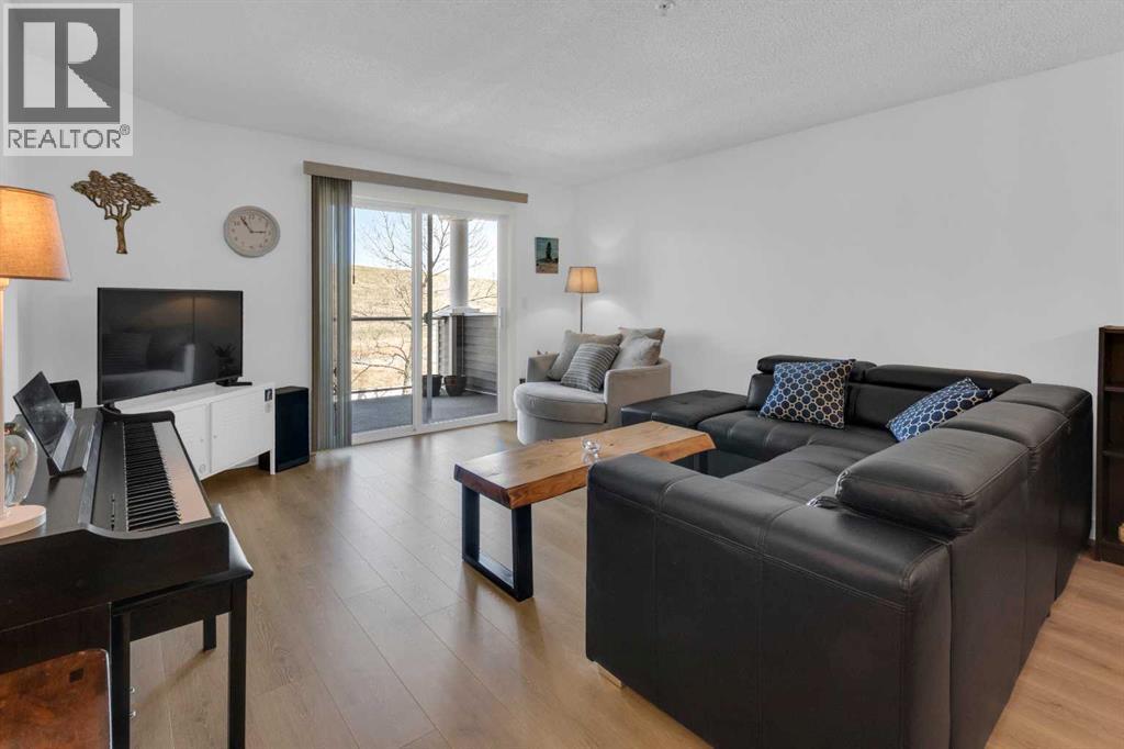 2212, 2212 Tuscarora Manor Nw, Calgary, Alberta  T3L 2J9 - Photo 3 - A2302720