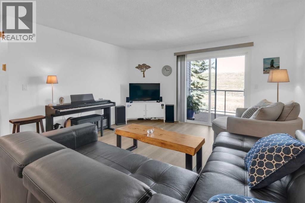 2212, 2212 Tuscarora Manor Nw, Calgary, Alberta  T3L 2J9 - Photo 4 - A2302720