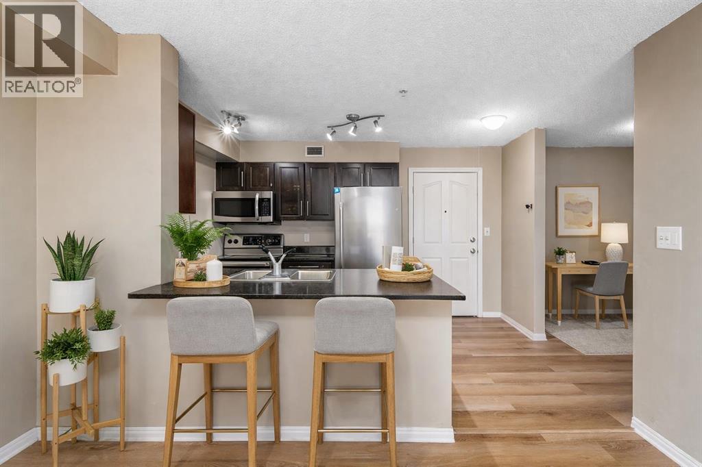 210, 7130 80 Avenue Ne, Calgary, Alberta  T3J 0N5 - Photo 3 - A2297425