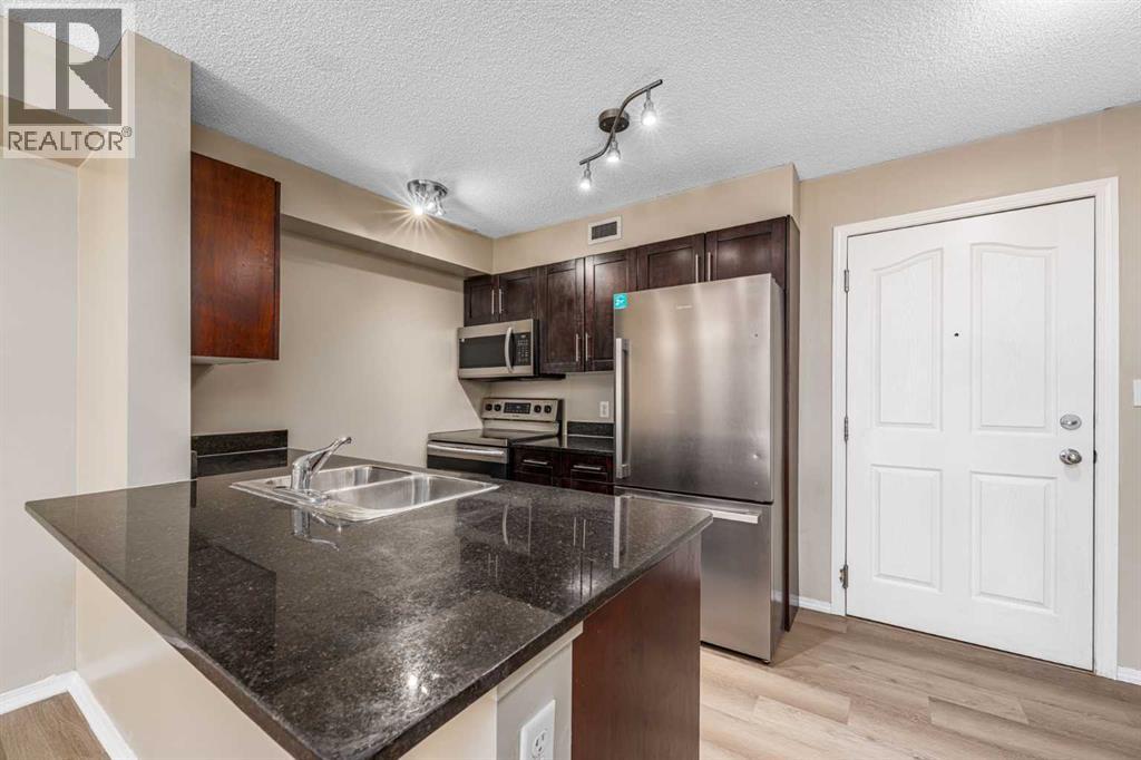210, 7130 80 Avenue Ne, Calgary, Alberta  T3J 0N5 - Photo 4 - A2297425