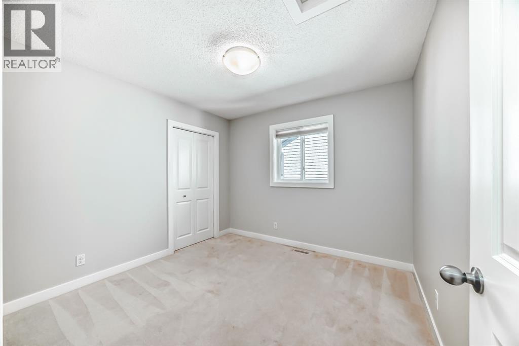 9 Panton View Nw, Calgary, Alberta  T3K 0W2 - Photo 15 - A2302629