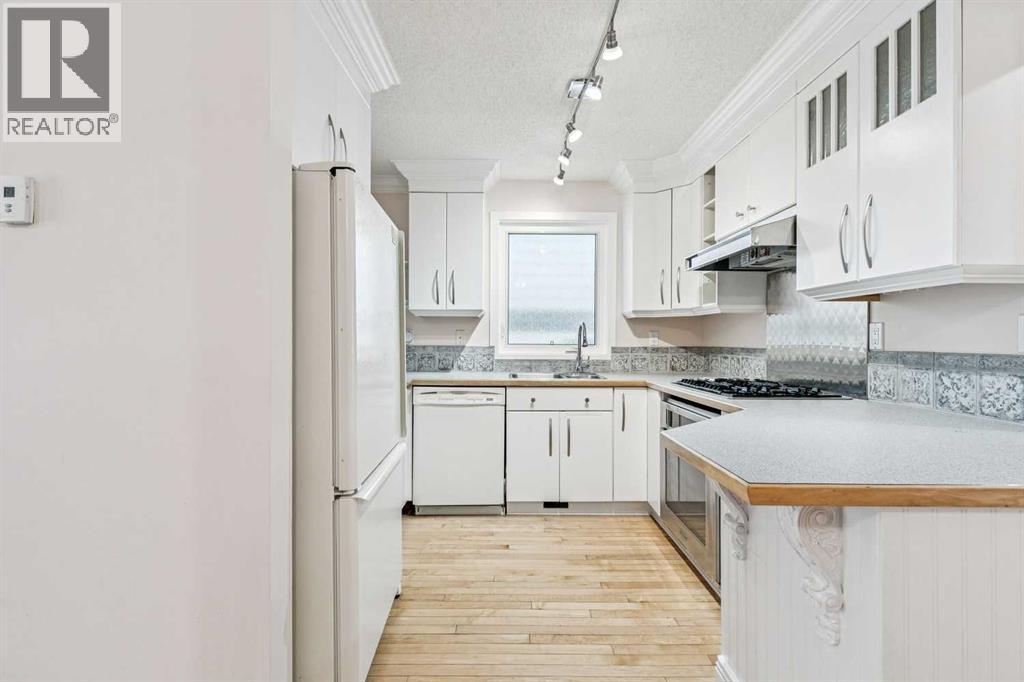 131 Woodglen Way Sw, Calgary, Alberta  T2W 4L9 - Photo 11 - A2298404