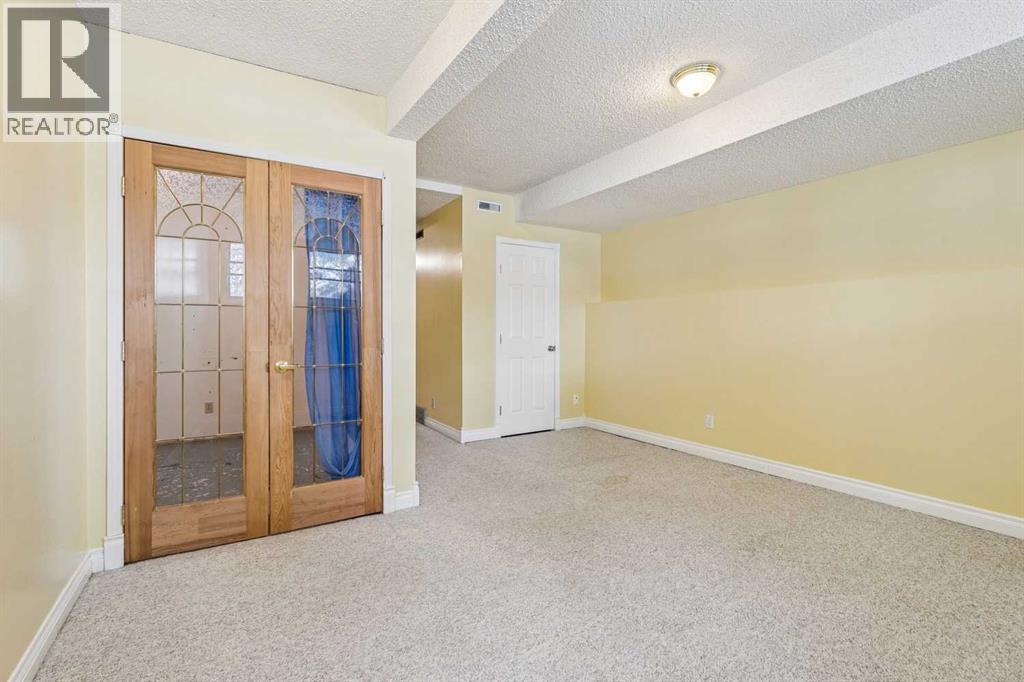 131 Woodglen Way Sw, Calgary, Alberta  T2W 4L9 - Photo 22 - A2298404