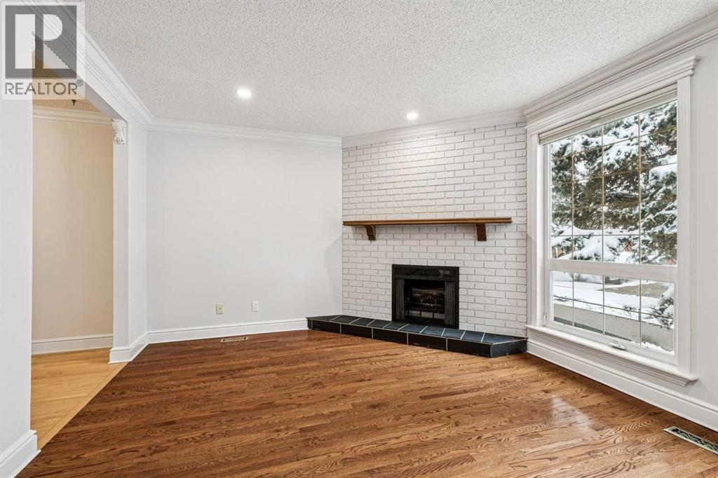 131 Woodglen Way Sw, Calgary, Alberta  T2W 4L9 - Photo 4 - A2298404