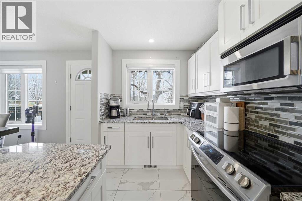 72 Abberfield Court Ne, Calgary, Alberta  T2A 7N4 - Photo 7 - A2301952