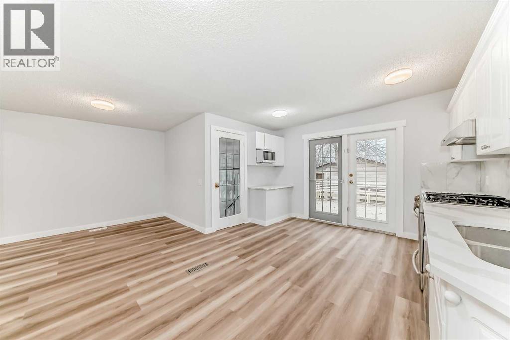 307 Huntridge Road NE, Calgary, Alberta  T2K 4B8 - Photo 7 - A2300263