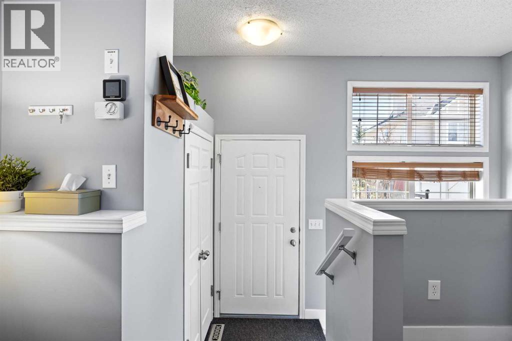 3065 New Brighton Gardens SE, Calgary, Alberta  T2Z 0A4 - Photo 3 - A2304080