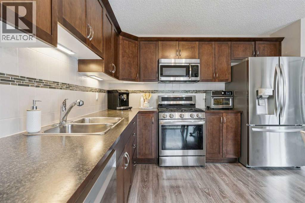 42 Windwood Grove Sw, Airdrie, Alberta  T4B 3T2 - Photo 9 - A2288672