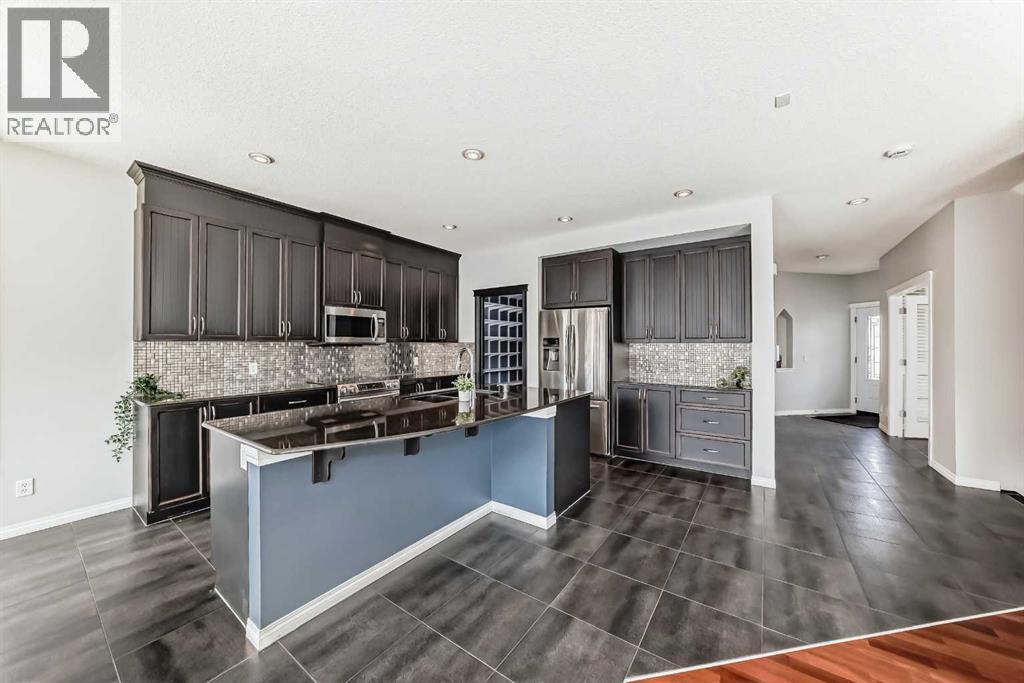 65 Morningside Circle SW, Airdrie, Alberta  T4B 0L7 - Photo 3 - A2302595