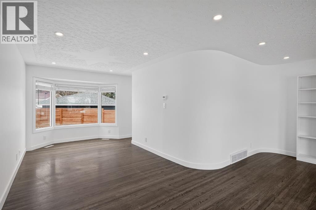 48 Carnarvon Way Nw, Calgary, Alberta  T2K 1W4 - Photo 7 - A2299371