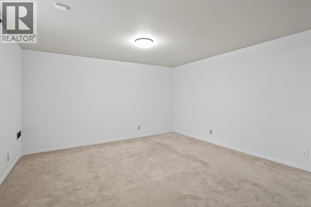 48 Carnarvon Way Nw, Calgary, Alberta  T2K 1W4 - Photo 31 - A2299371