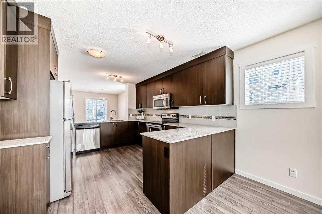 204 Auburn Bay Circle Se, Calgary, Alberta  T3M 1S7 - Photo 7 - A2304015