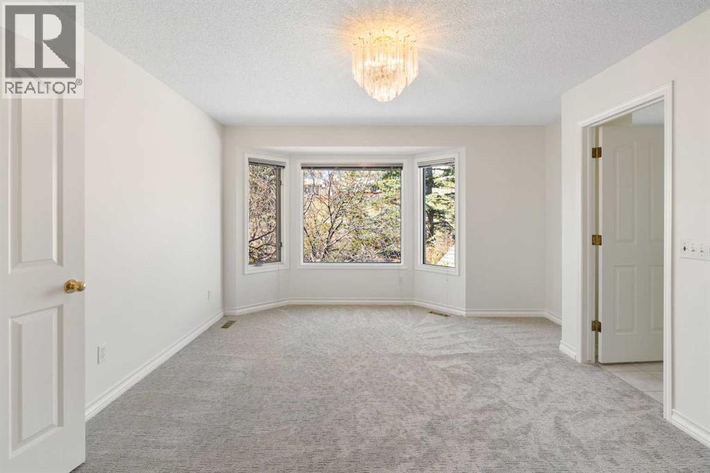 156 Macewan Park Green NW, Calgary, Alberta  T3K 4E6 - Photo 23 - A2295537