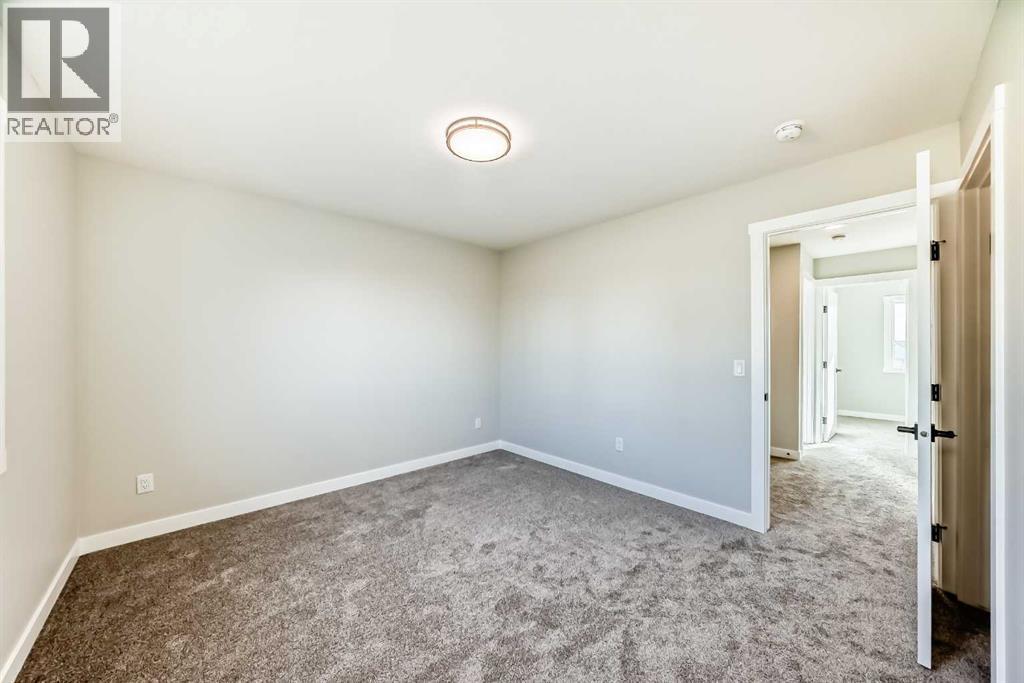 703 Clover Road, Carstairs, Alberta  T0M 0N0 - Photo 23 - A2297902