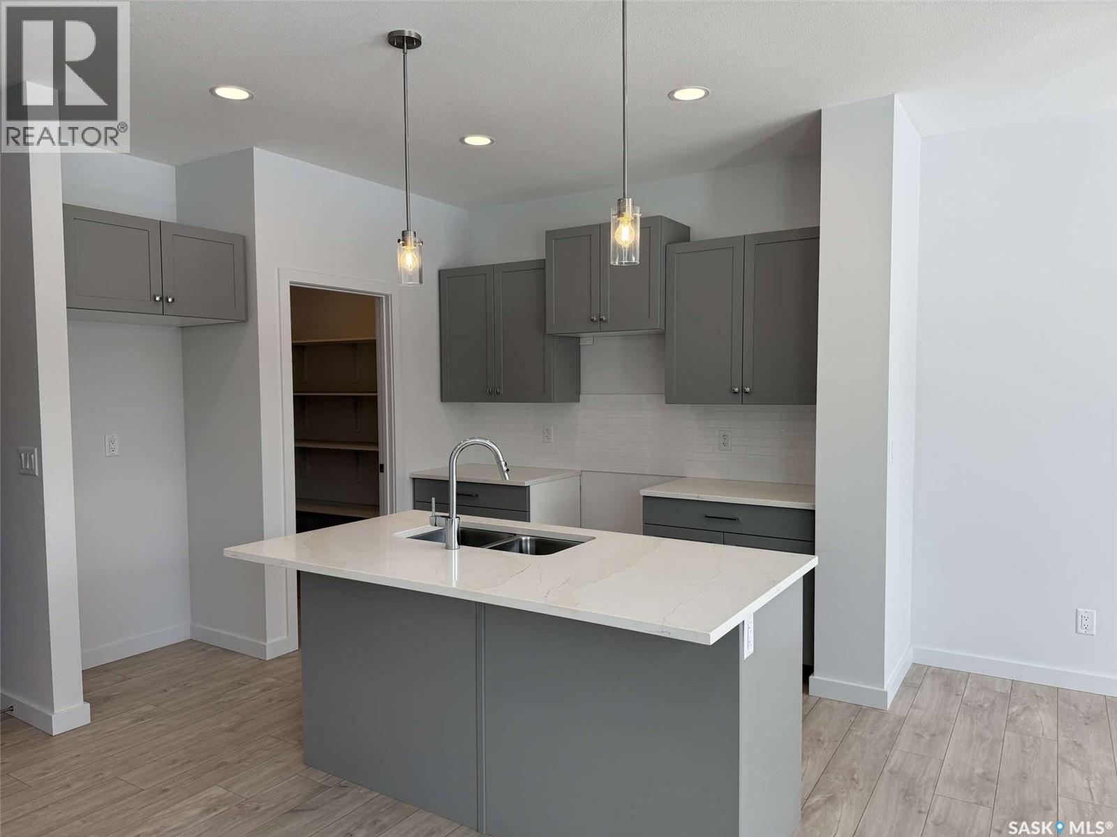 319 Cowessess Road, Saskatoon, Saskatchewan  S7V 1M3 - Photo 2 - SK028059