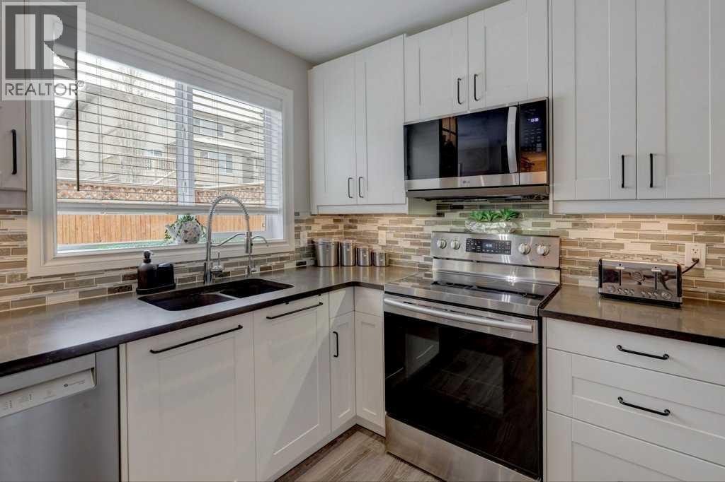 2033 Sagewood Point SW, Airdrie, Alberta  T4b 3P1 - Photo 6 - A2293088