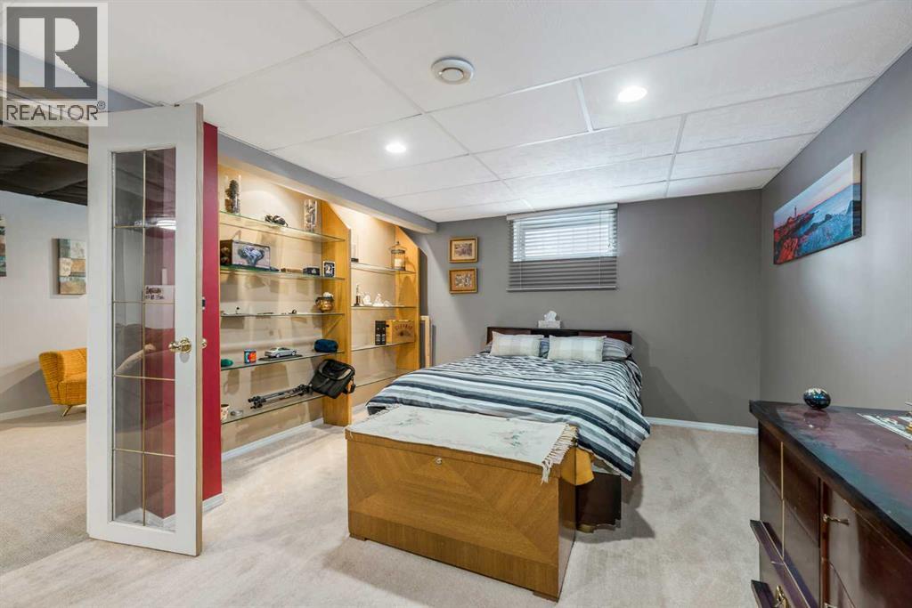 126 Springwood Drive SW, Calgary, Alberta  T2W 0K5 - Photo 20 - A2288413