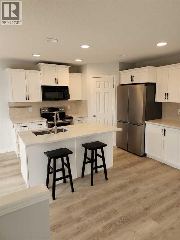 15 Tuscany Reserve Bay Nw, Calgary, Alberta  T3L 0A9 - Photo 6 - A2279905