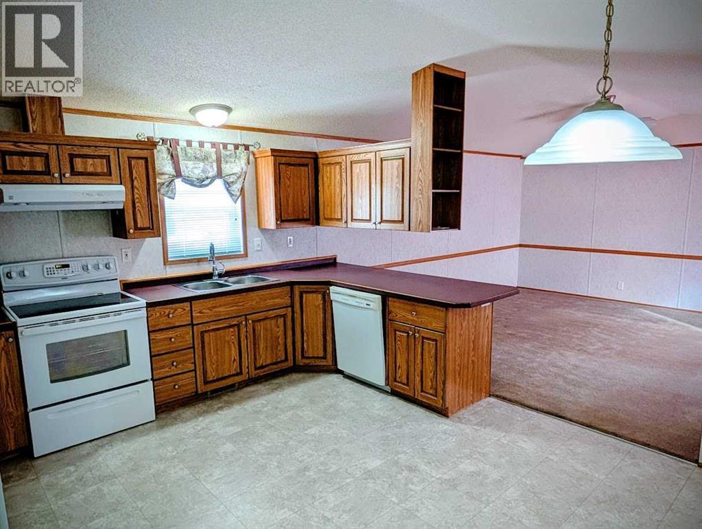 211 Railway Avenue, Coaldale, Alberta  T1M 0A8 - Photo 5 - A2295784