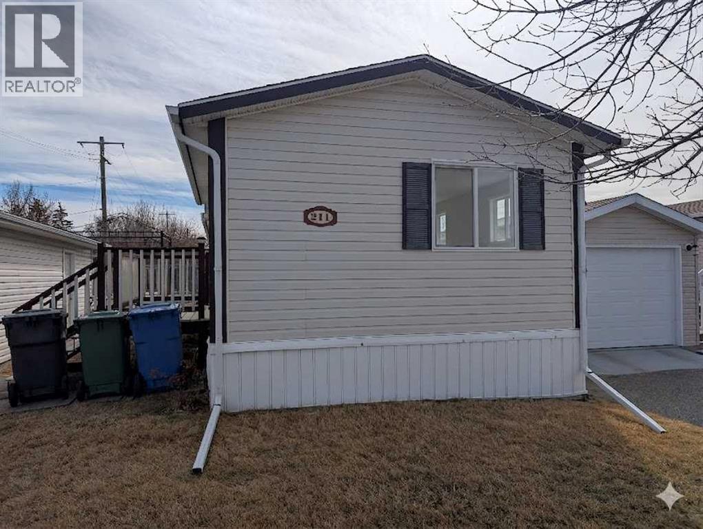 211 Railway Avenue, Coaldale, Alberta  T1M 0A8 - Photo 1 - A2295784